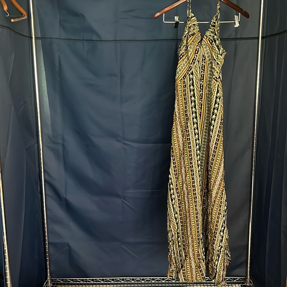 Beautiful green spaghetti strap cross over back dress